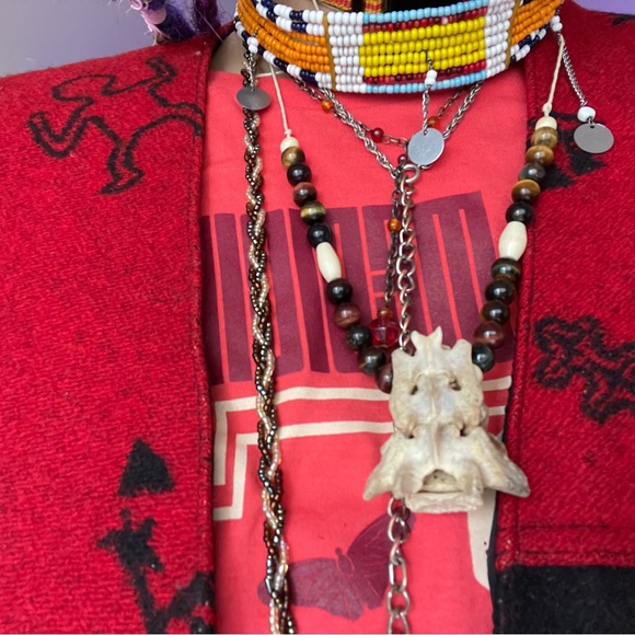 🦴🐯📿 - Picture 2 of 2